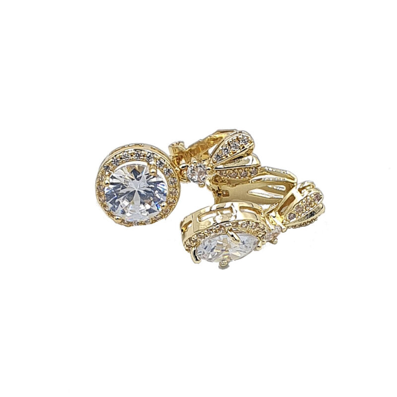 Gold ring set with a large round center diamond and pavé-diamond bands in a halo style