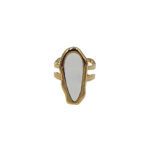 Gold-tone adjustable ring featuring a tall, irregular white stone bezel-set in the center.