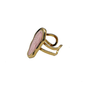 Gold ring featuring an oval pink marbled stone set in a bezel on an open adjustable band at an angle