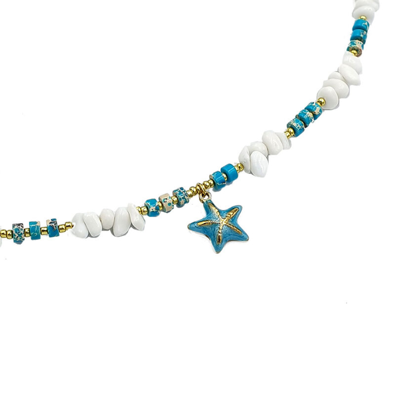 Beaded necklace with white and turquoise beads and a blue starfish pendant on a white background