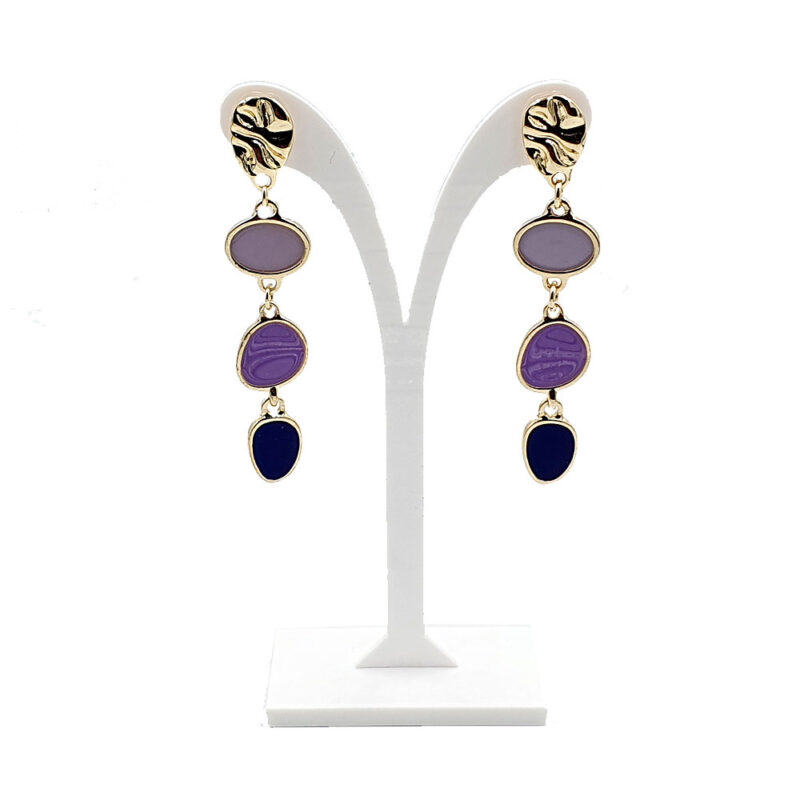 Gold-tone drop earrings with four colored stones (lavender to navy) on a white display stand.