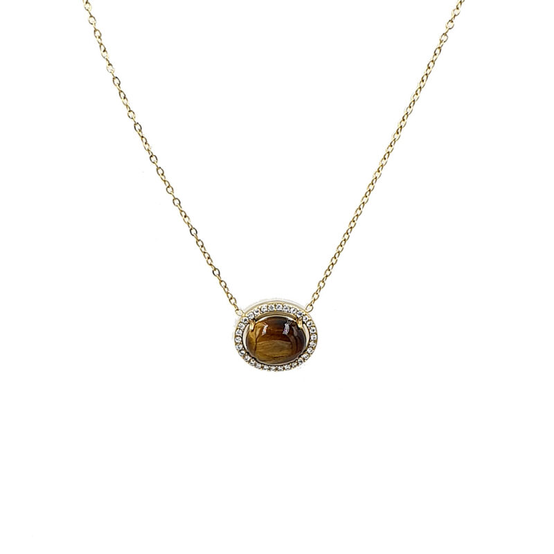 Gold chain necklace with oval tiger's eye gemstone surrounded by small diamonds on a halo pendant lens.