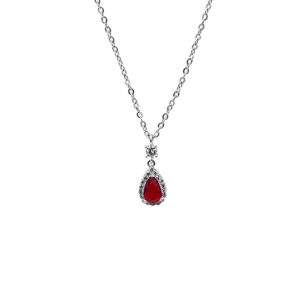 Silver chain necklace with a red teardrop gemstone pendant surrounded by small diamonds on a white background.