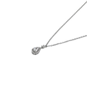 Teardrop-shaped diamond pendant on a silver chain, close-up. The pendant has a halo of small stones and hangs from a delicate chain.