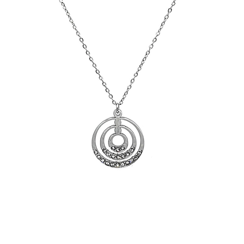 Silver necklace with a pendant of three concentric circles, the bottom arc encrusted with small crystals on a silver chain from behind the neck.