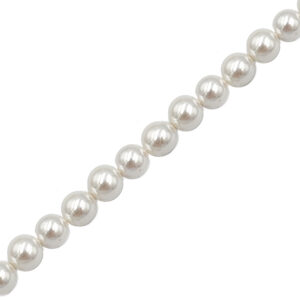 Row of white pearl beads on a string, close-up diagonal view of a pearl necklace