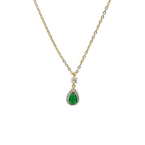 Gold chain necklace with a teardrop green gemstone pendant surrounded by small diamonds