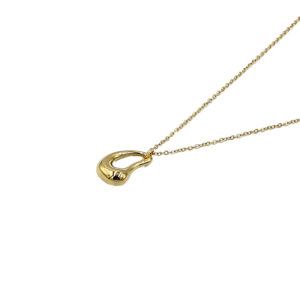 Gold necklace with a small curved lock-shaped pendant on a thin chain.