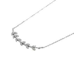 Delicate silver necklace with a curved branch pendant studded with small crystals/diamonds