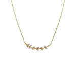 Gold necklace with a curved vine design adorned with small crystals leaves.