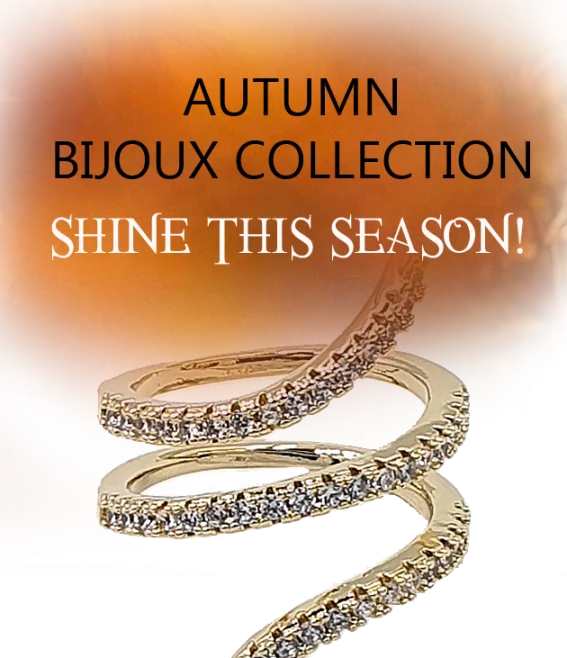 Promotional image for Autumn Bijoux Collection with diamond-studded rings on a warm orange background.